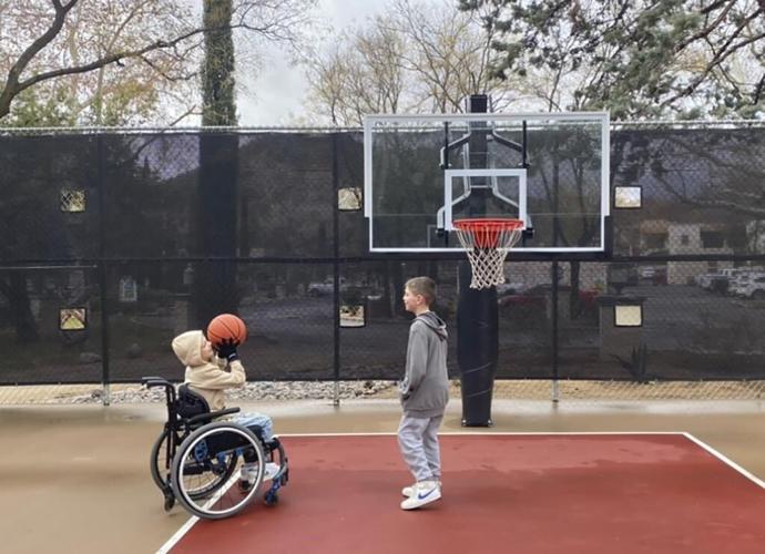 The July Fourth parade shooting paralyzed a boy. His life remains shattered 2 years later, mom says