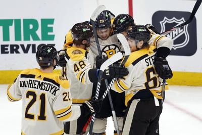 NHL roundup: Pastrnak score twice as Bruins beat Red Wings 4-1