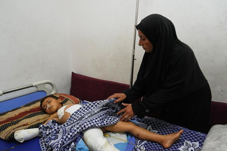 A bomb in Gaza's rubble wounds twins who thought it was a toy