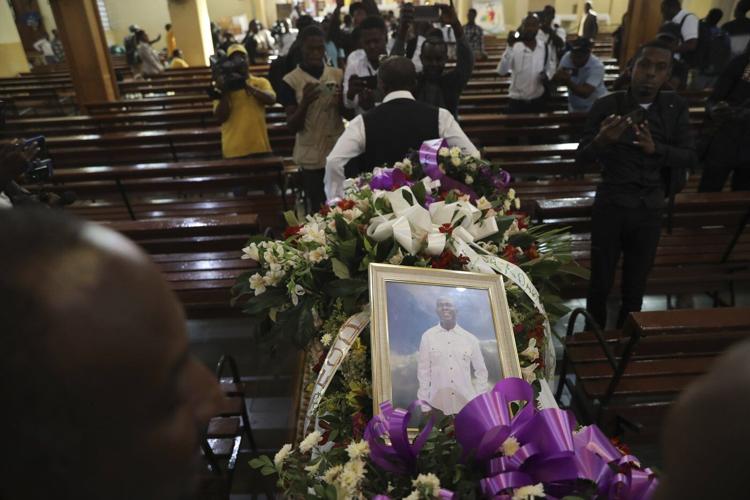 Mourners bury journalist killed in one of Haiti's worst attacks on reporters