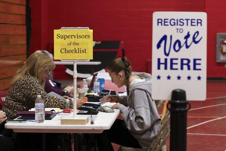 Federal judge will wait to rule on an effort to block Trump's executive order on elections