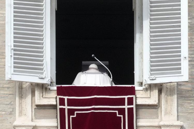 Pope Francis baptizes 21 babies in an annual ceremony at the Sistine Chapel