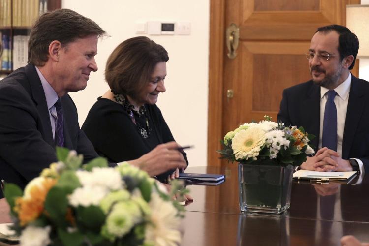 Ethnically split Cyprus' rival leaders say they're ready for UN-led meeting to restart peace talks
