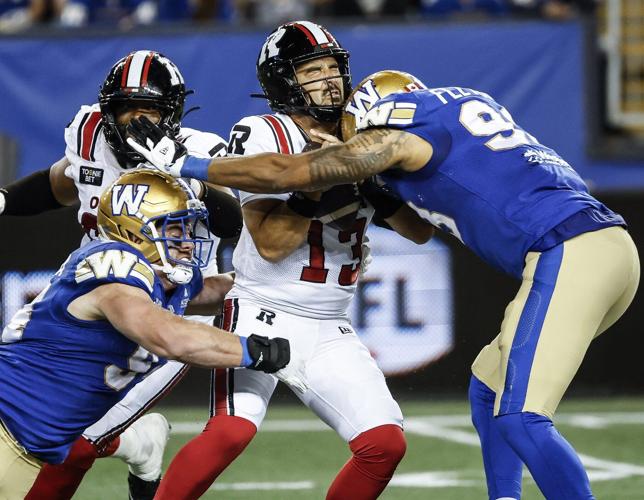Oliveira helps Blue Bombers roll past winless Redblacks 33-21