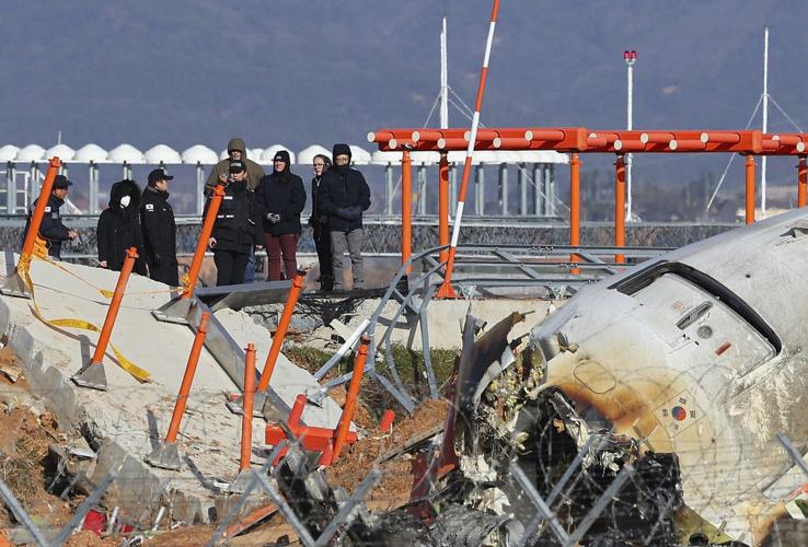 US and Boeing investigators examine the site of a deadly South Korean plane crash