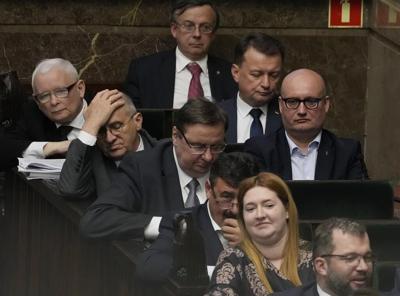 Poland's lawmakers approve contentious law targeting opposition