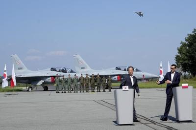 South Korean and Polish leaders visit an air base in eastern Poland, discuss defense and energy ties