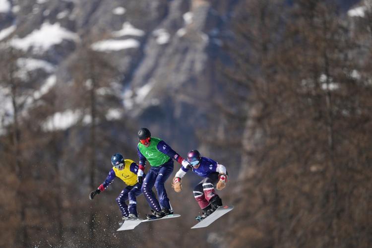 Paralympians ski in shorts and T-shirts, and some ask: Shouldn’t these Games be earlier?