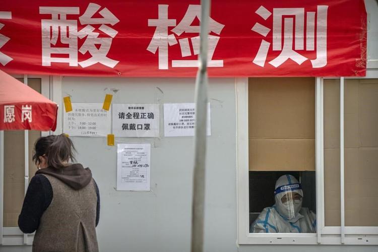 China's vast Xinjiang hit with COVID-19 travel restrictions