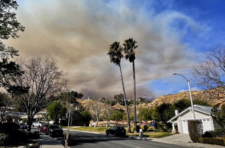 Evacuations ordered as new fast-moving wildfire threatens mountain homes north of Los Angeles