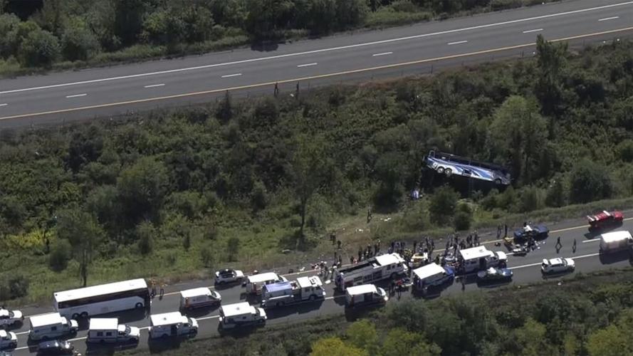 Bus carrying high school students to band camp crashes, killing 2 and seriously injuring others