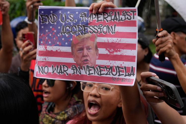 Photos show people reacting to the US capture of Venezuelan President Nicolas Maduro
