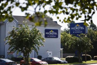 A woman accused of aiding an escaped prisoner appears in a North Carolina court