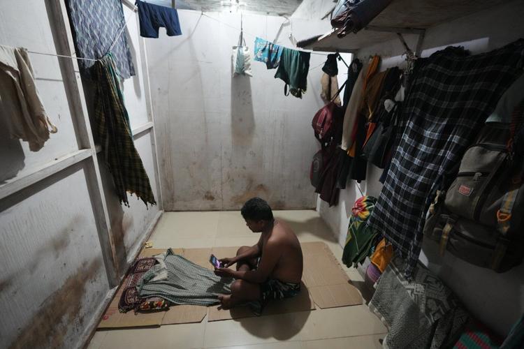 How one Indian textile worker copes with extreme heat in factory work and cramped living quarters