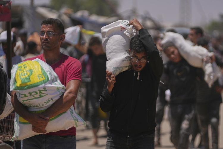An Israeli strike kills 18 Palestinians in central Gaza as turmoil mounts over food distribution