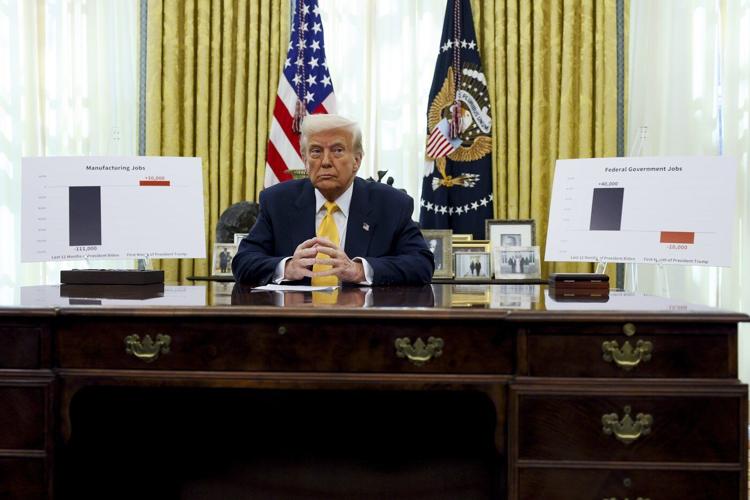 Trump hangs a copy of Declaration of Independence in Oval Office