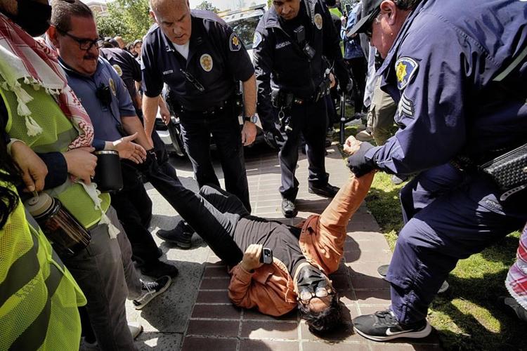 Arrests roil campuses nationwide ahead of graduation as protesters demand Israel ties be cut