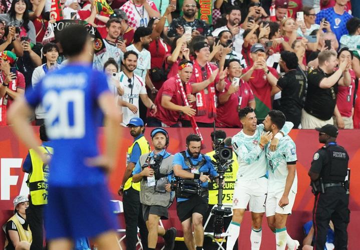 Portugal fans celebrate victory against Croatia in Toronto's last World Cup match