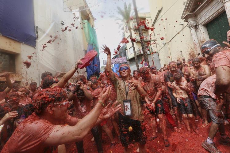 Tons of overripe tomatoes become projectiles in Spain's ‘Tomatina’ food fight