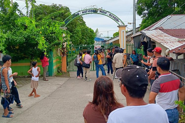 High school shooting in the Philippines kills 3, and police arrest 2 students