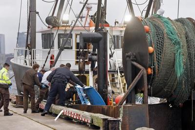 Tanker crew member falls overboard, prompting frantic search, trip to shore for medical care