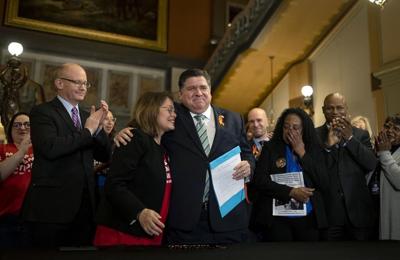 Illinois governor, sheriffs spar over semiautomatic gun law