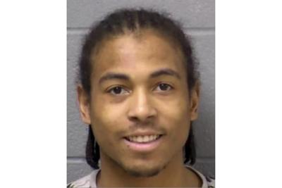 Girlfriend of suspect in fatal shootings of 8 in Chicago suburb charged with obstruction, police say