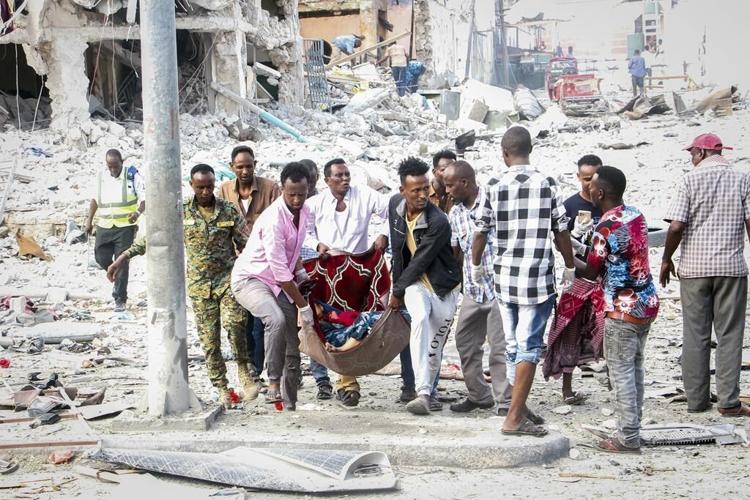 Somalia's president says at least 100 killed in car bombings
