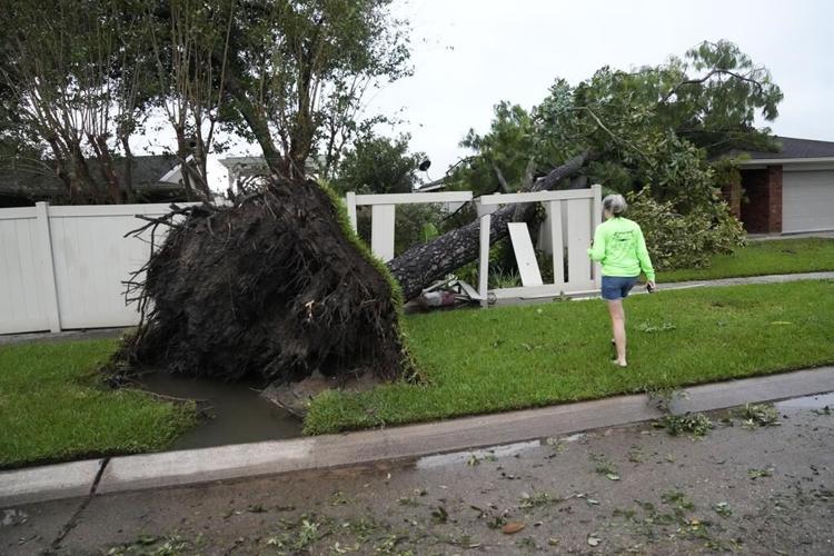 Francine weakens moving inland as the storm leaves behind flooding and widespread power outages