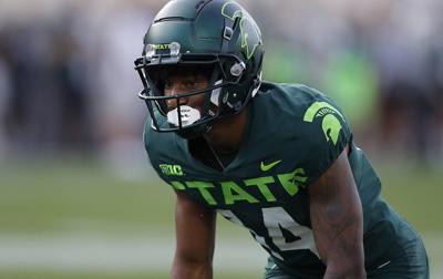 Michigan State player who swung helmet gets probation