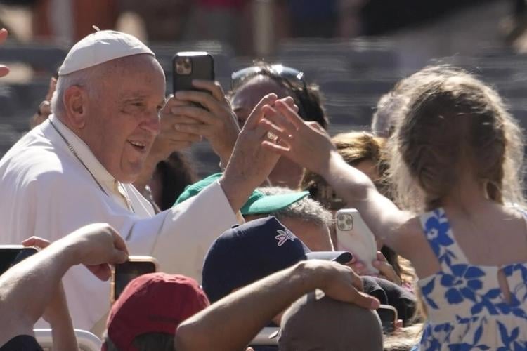 Pope appears at general audience after hospital checkup