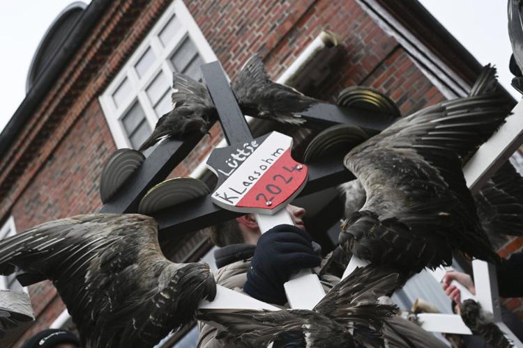 German island festival passes peacefully after criticism over practice of men hitting women