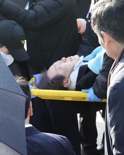 South Korean opposition leader is stabbed in the neck by a knife-wielding man