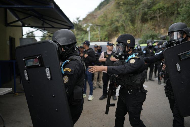 Death toll rises to 9 in gangsters' attacks on Guatemalan police as state of emergency is declared