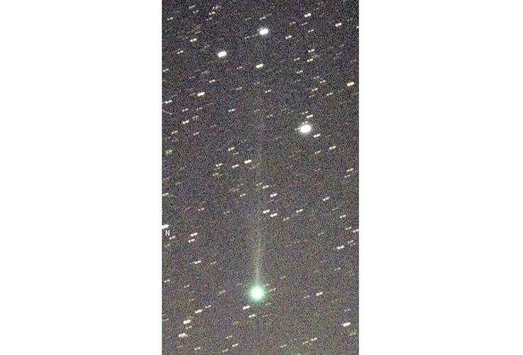 A green comet likely is breaking apart and won't be visible to the naked eye