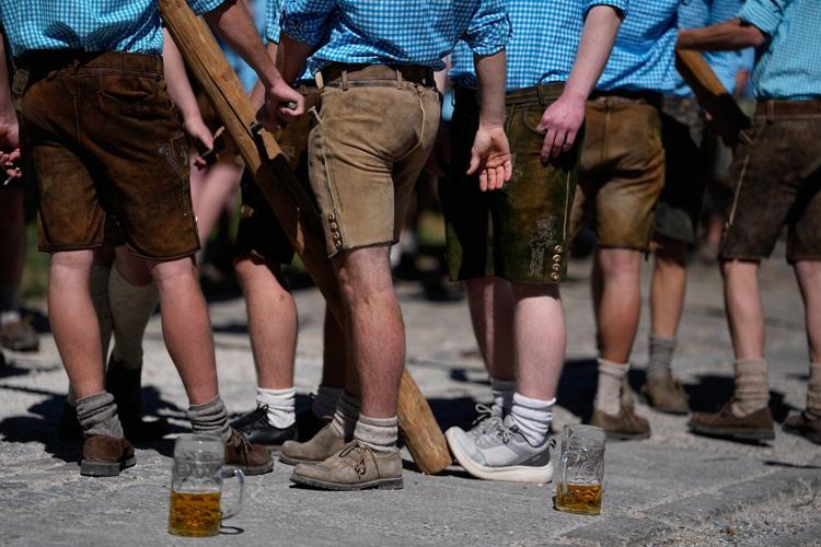Beer, music and shouts of 'Hau-Ruck' as a Bavarian village raises its new maypole