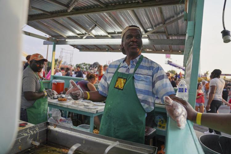 Migrants to Iowa strike different portraits where 'American Gothic' was created