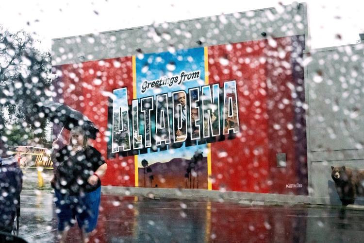 Atmospheric river hits Southern California with risks of flash floods in fire-ravaged areas, coast