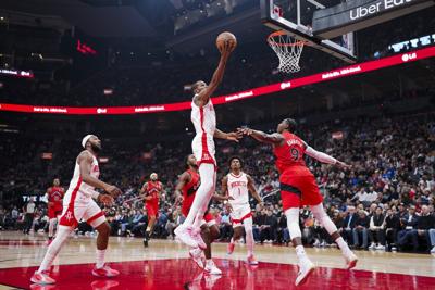 Durant's 31 points leads bigger Rockets past Poeltl-less Raptors 139-121
