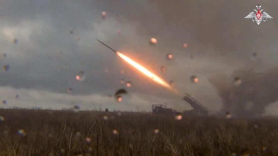 Russian bomb hits building in Ukraine's 2nd largest city, killing 3, including 2 teens