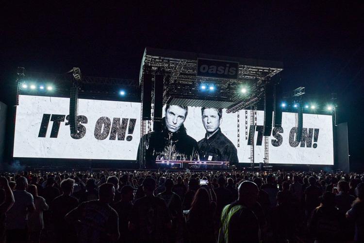 Drenched and nostalgic, Oasis marks Toronto return amid sudden downpour