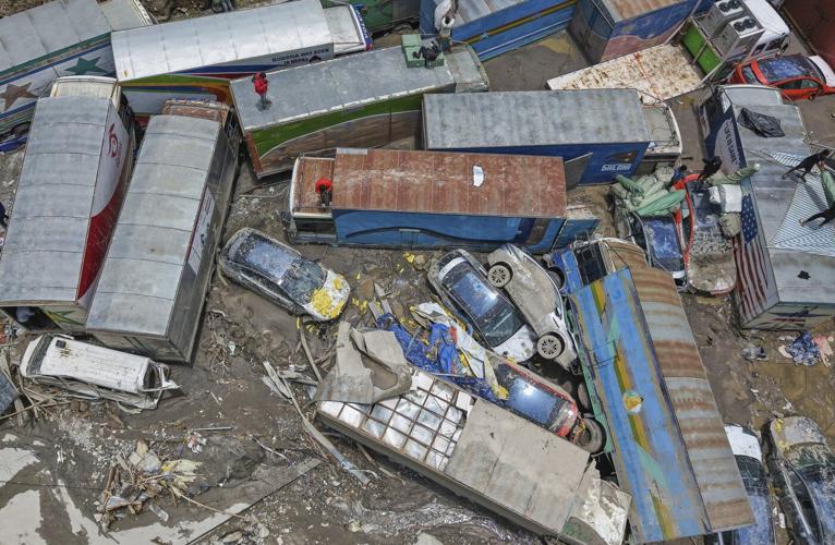 Rescuers search for 19 missing and recover 9 bodies after flooding in Nepal