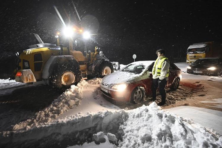 Extreme cold leaves thousands without power in Nordic countries as floods persist in Germany