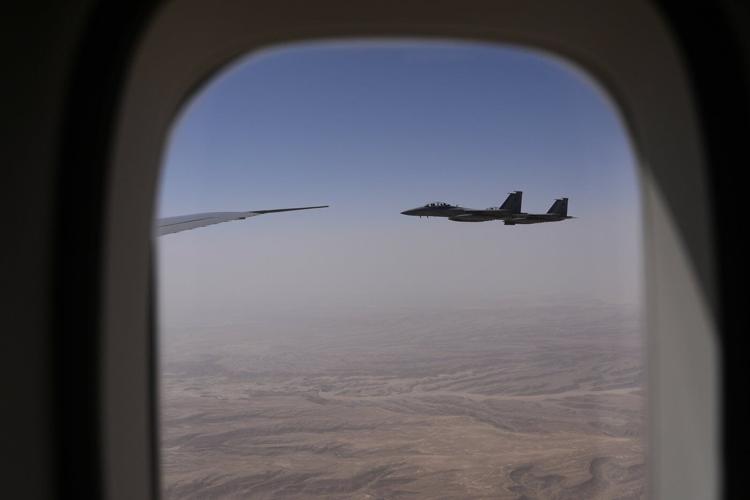 Trump's Qatar trip is off to a flying start as Air Force One gets another fighter jet escort