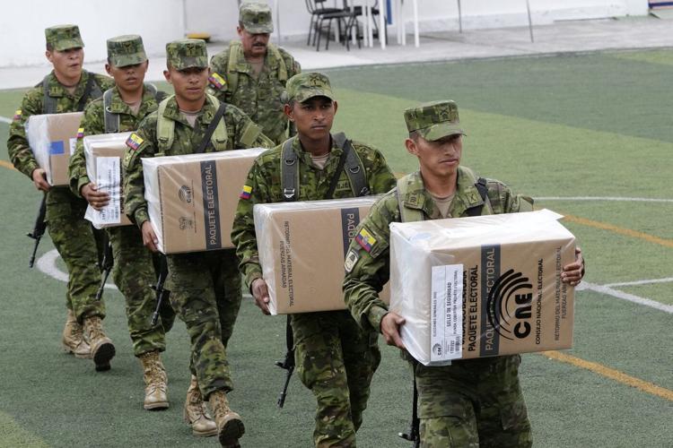 Polls open in Ecuador with conservative incumbent and leftist lawyer leading the presidential race