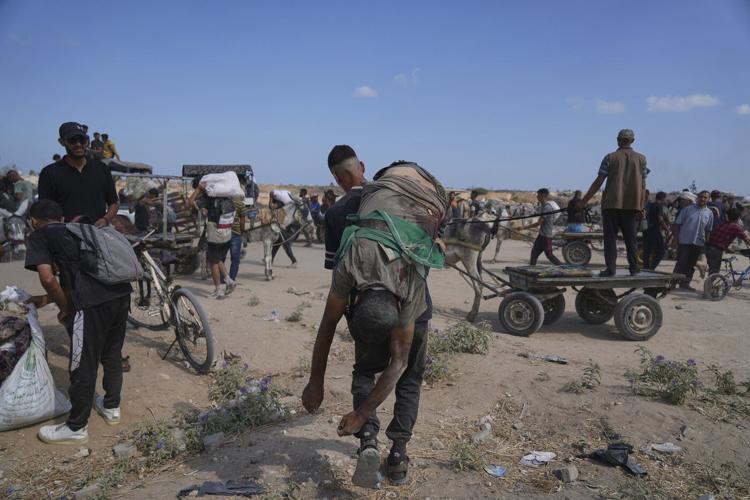 Dozens killed as Palestinians in Gaza scramble for aid from air and land