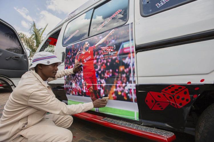 Photos of taxi drivers in Zimbabwe showing off team colors for the Premier League soccer season