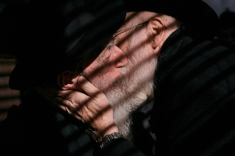 Photos of Hasidic Jewish rabbis praying at resting place of 'the Rebbe' in New York