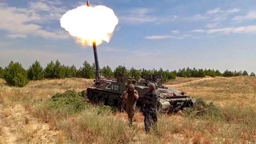 Russian bomb hits residential building in Ukraine's 2nd largest city, killing 12-year-old boy