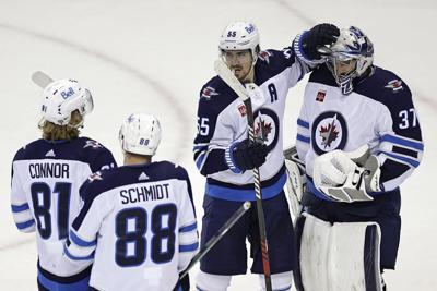 Scheifele, Hellebuyck sign identical, long-term extensions with Winnipeg Jets